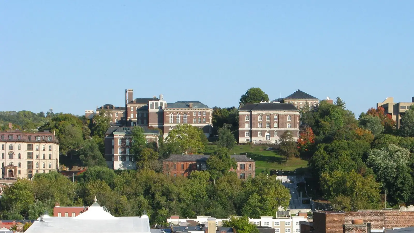 Rensselaer Polytechnic Institute campus buildings on the hill above downtown Troy